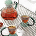 Limoges: A Set Of Glass Teapot Set And Two Glasses