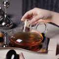 RSTEA: A Set Of Glass Teapot And Cup