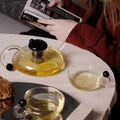 RSTEA: A Set Of Glass Teapot And Cup