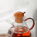 Limoges: A Set Of Glass Teapot Set And Two Glasses