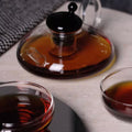 RSTEA: A Set Of Glass Teapot And Cup