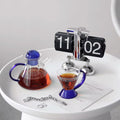 Limoges: A Set Of Glass Teapot Set And Two Glasses