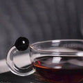 RSTEA: A Set Of Glass Teapot And Cup