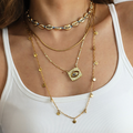 Misty Textured Gold Tone Pendant Necklace