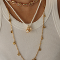 Misty Textured Gold Tone Pendant Necklace